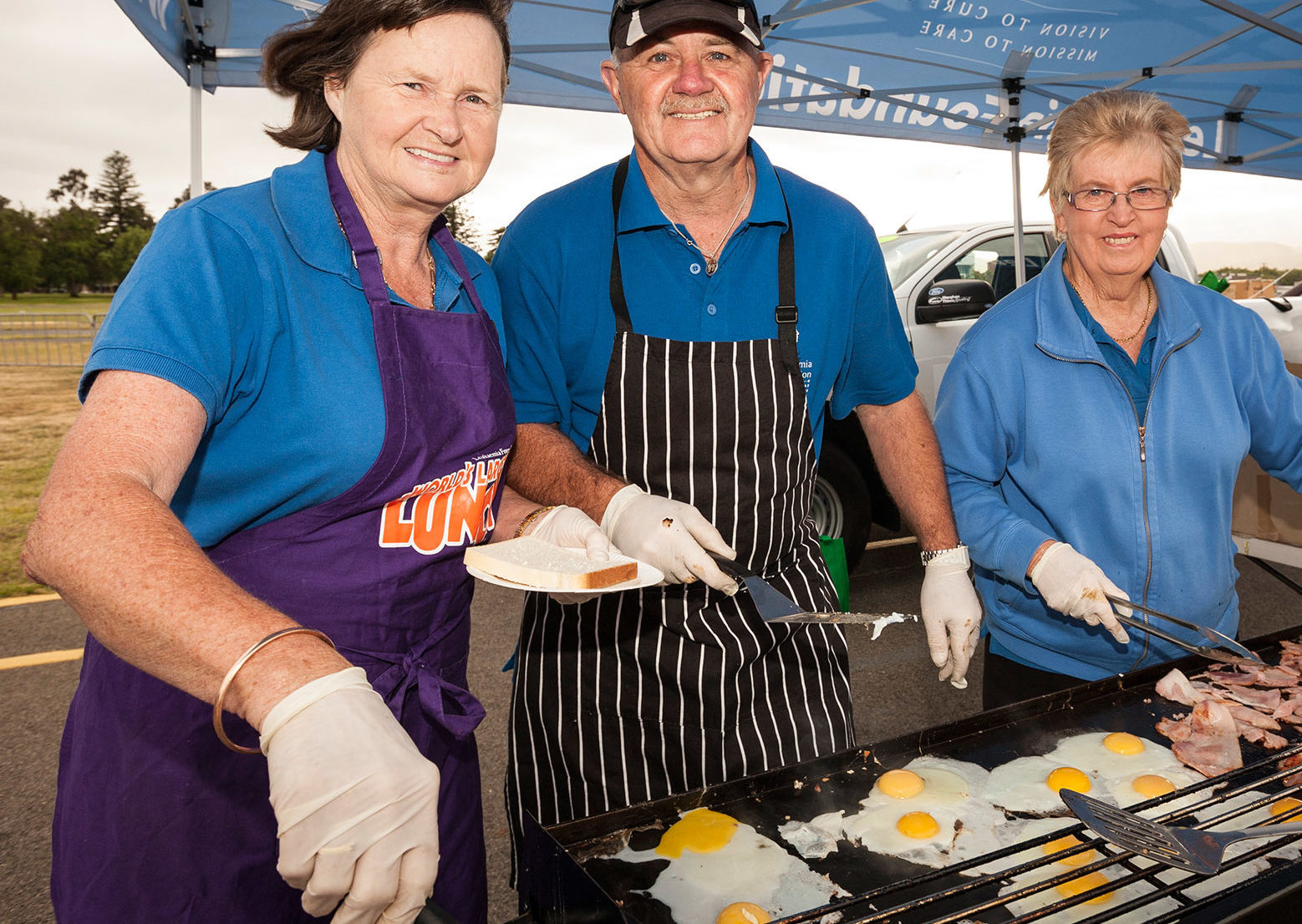 Leukaemia Foundation fundraisers holding a BBQ