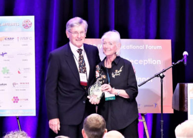 Andrew Warden receiving the Judith May Volunteer Award from the IWMF in Philadelphia in June 2019.
