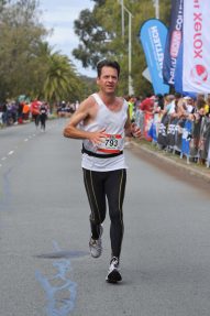 Matt running in the City to Surf Marathon in 2009