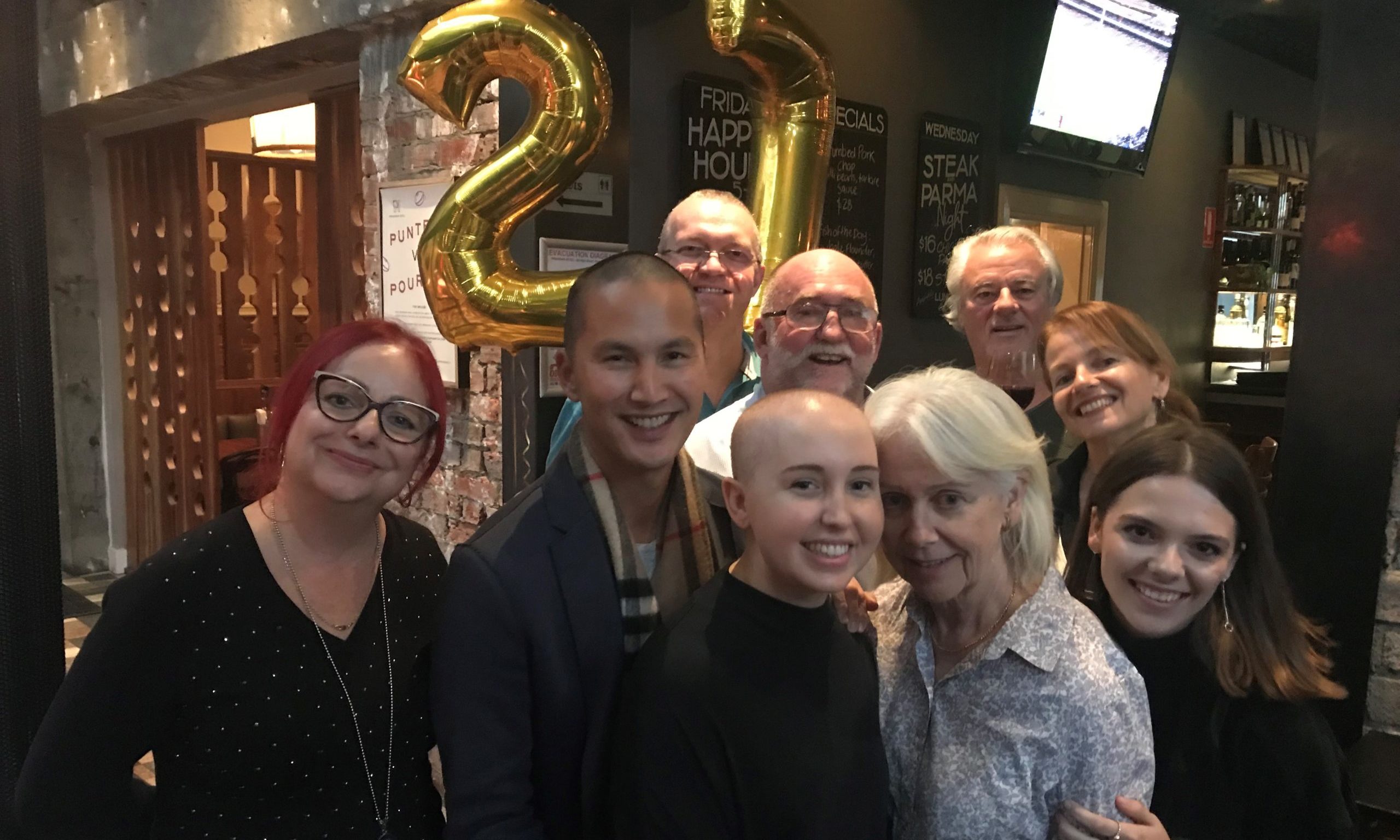 Brett Conley, centre front, with her family on her 27th birthday in 2018. 