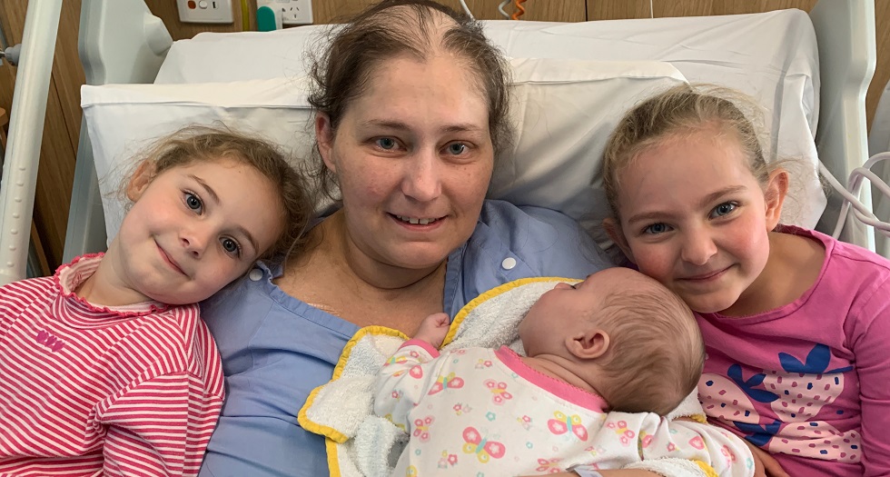 Jocelyn Raunjak with her three daughters, Rebecca, Samantha and Michelle in the hospital