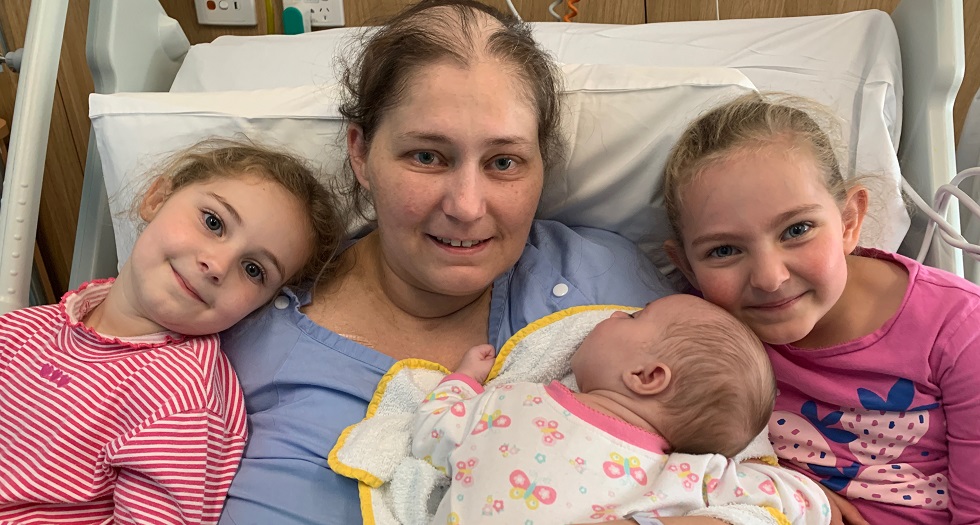 Jocelyn Raunjak with her three daughters, Rebecca, Samantha and Michelle in the hospital