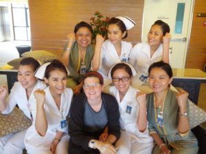 Eleanor with the Thai medical team who cared for her through her diagnosis