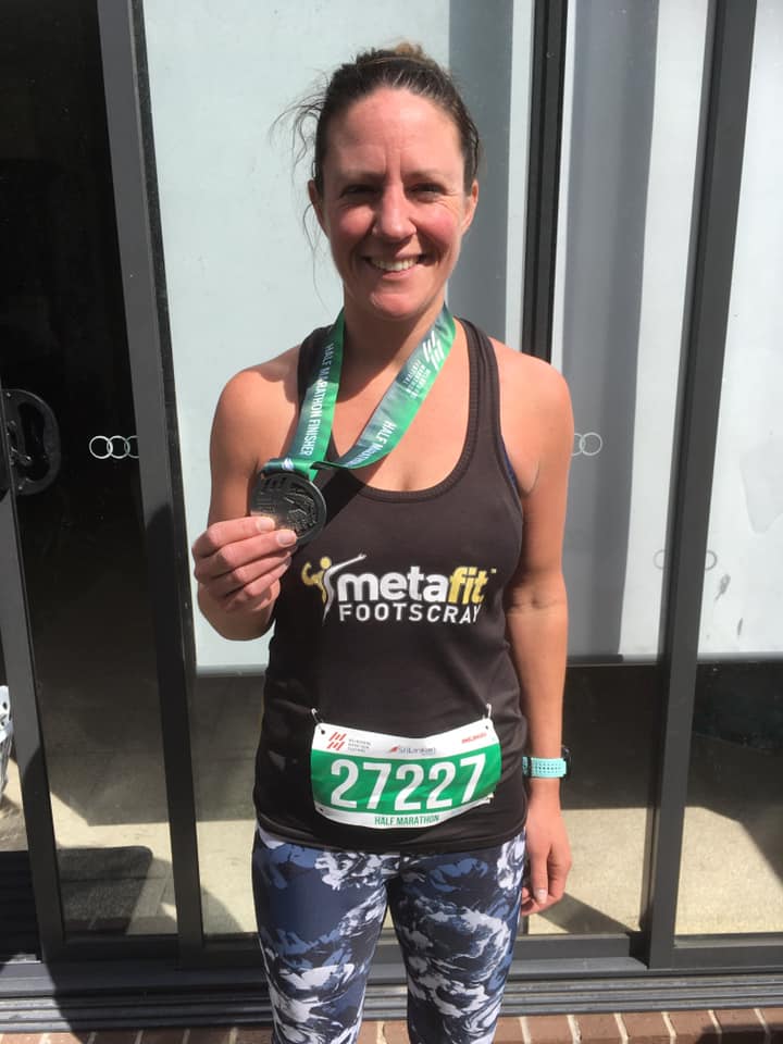 Jennie Wiggington with her medal for Melbourne Marathon