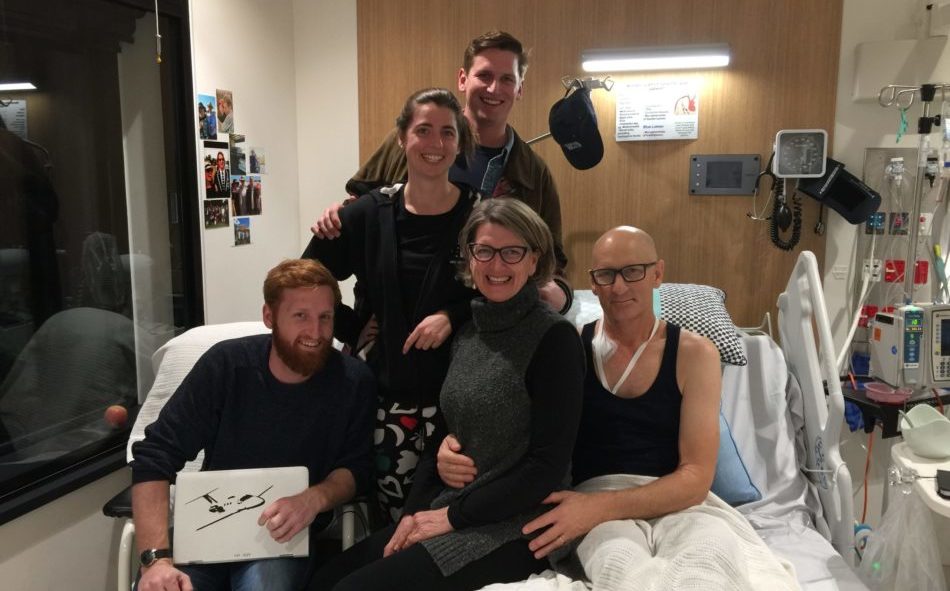 Geoffrey Hamilton with his family in hospital