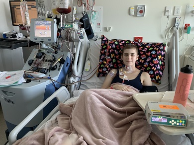 Megan Reid in hospital undergoing treatment