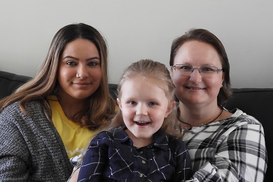 Rowena with her daughters, Alycia and Haylee before starting treatment again in 2020.