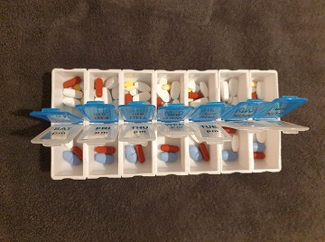 A week's worth of pills: "I'm surprised I don't rattle when I walk."