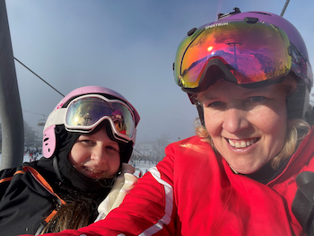 Deborah Sims and daughter on the ski field