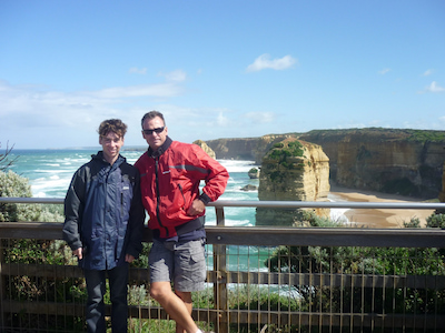Hugh with his dad on the Great Ocean Road in 2011