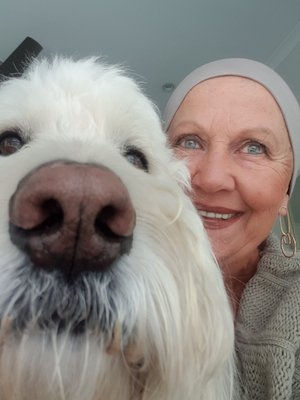 Diane with her dog Ollie's nose