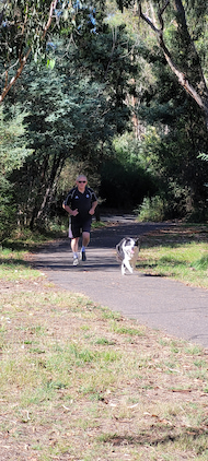David Boyle running with dog