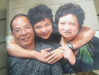 Esther Xu with her parents