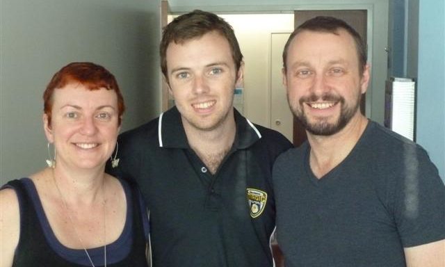 Three adult siblings smile at the camera: Fiona, Edward and Sean Ryan