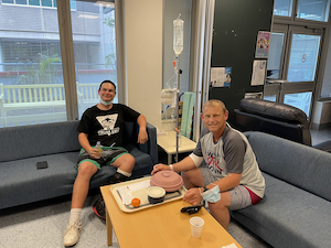 Dean visiting Graeme in hospital