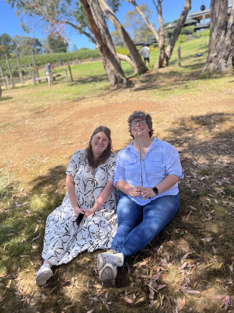 Ruth and I relaxing at our friend's 30th birthday in February 2025. I'm getting to enjoy the moments in life I would have missed.