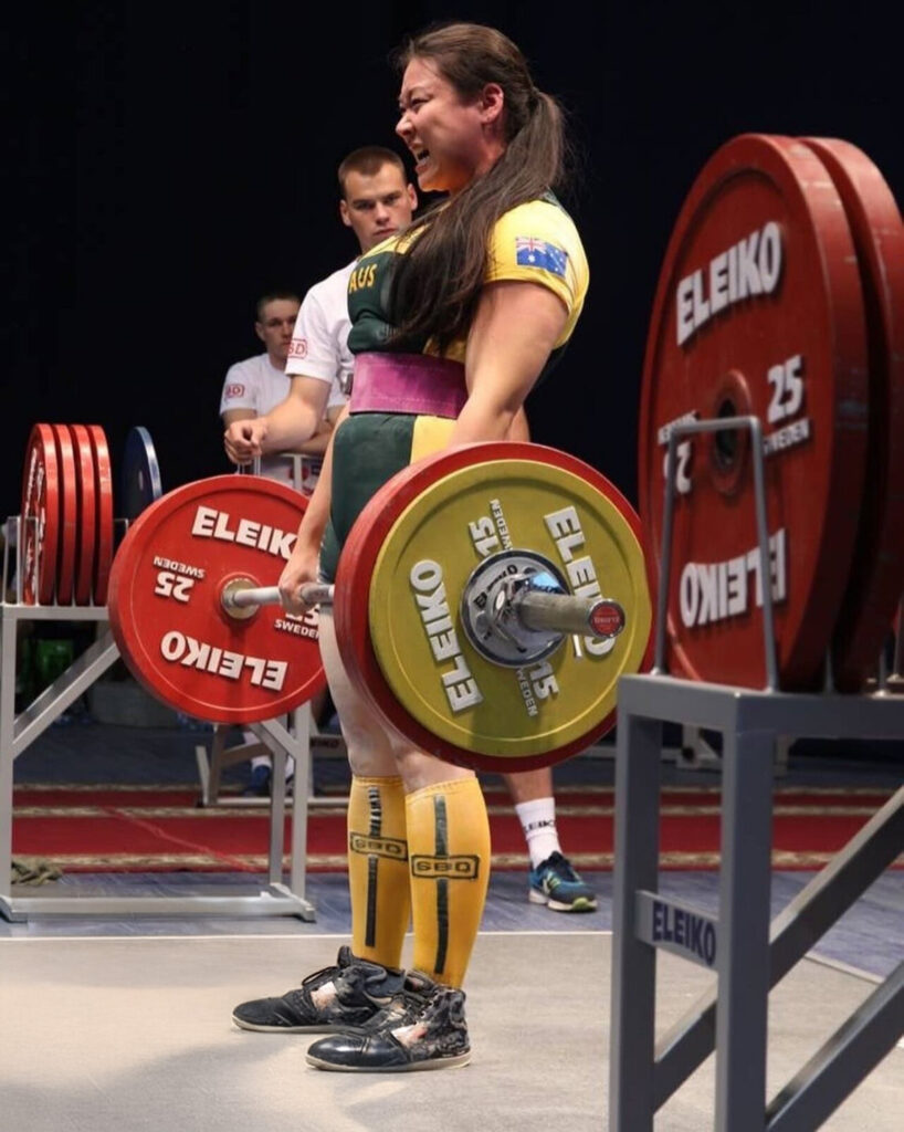 Yani Zhao competing in the national powerlifting championships.