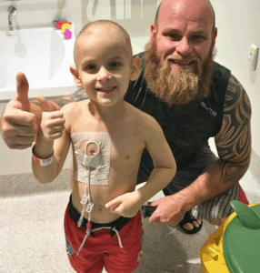 Chase all smiles with father Jamie.