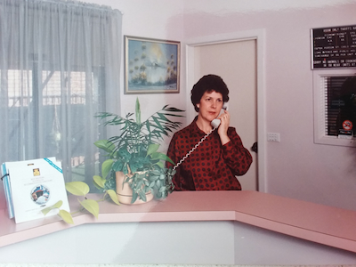 Heather Jenkins, in 1997 three years prior to her CML diagnosis, at the reception of the motel she and husband Wal ran for 22 years at Orange