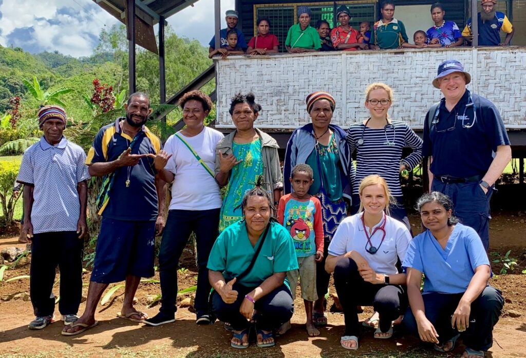 Rick Razey, far right, in Papua New Guinea during a nursing prac.